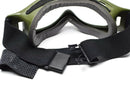 Genuine Dutch military goggles with flexible rubber frame and adjustable black strap for sun, sand, and wind protection.
