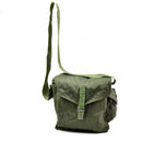 Vintage green canvas Soviet-era Polish military OM-14 gas mask carrying bag with adjustable shoulder strap
