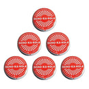 Six tin cans of German SCHO-KA-KOLA dark chocolate with caffeine and cola nut energy boost in red packaging.