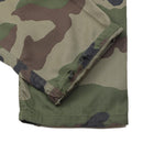 Close-up of French military cargo pants in CCE camo ripstop fabric with anti-mosquito treatment and adjustable cuffs