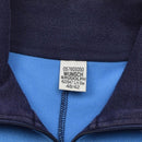 Close-up of inside collar label on vintage German military sports jacket showing brand and size details