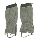 Pair of authentic olive drab French military combat gaiters with side zippers and adjustable straps for secure fit