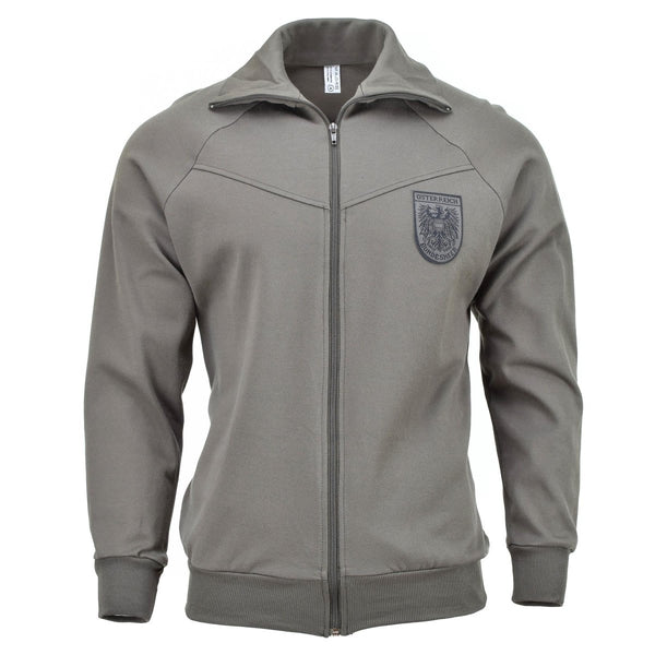 Genuine Austrian Army grey sports jacket with full zip and military insignia patch on chest, vintage style track jacket.