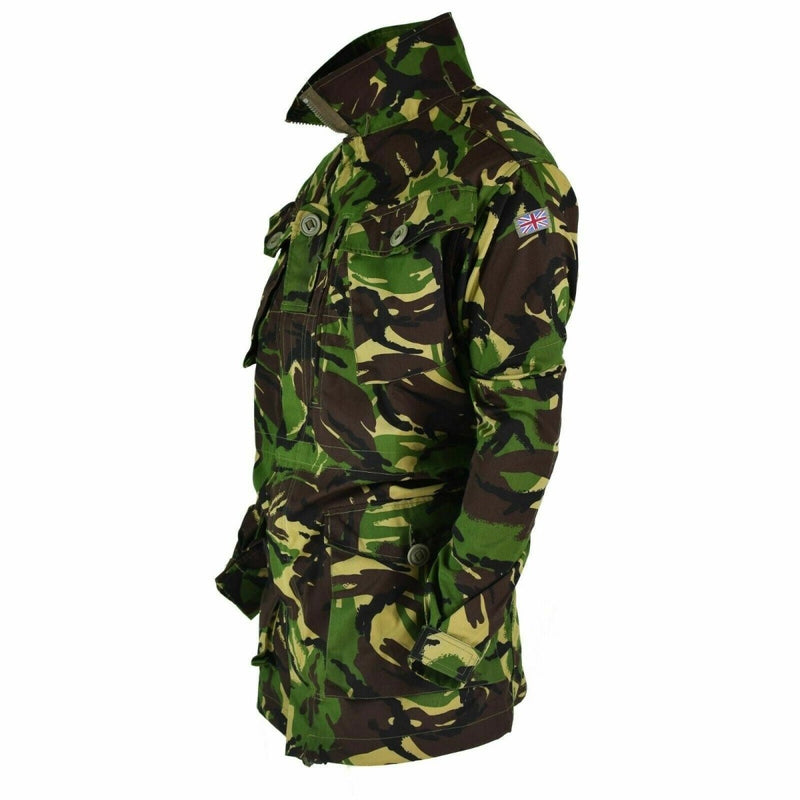 British Army DPM camouflage combat jacket with multiple pockets, adjustable cuffs, and UK flag patch on sleeve.