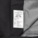 Label inside genuine British Metropolitan police waterproof rain trousers showing size and care instructions