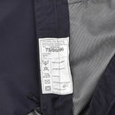 Care label inside genuine British police waterproof rain trousers for wet weather outdoor use in blue color