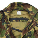 Close-up of genuine Dutch military tanker coverall with DPM camouflage and zippered inner pocket, high neck visible