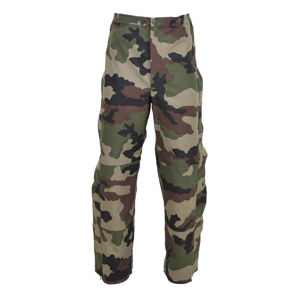 Genuine French Army trilaminate waterproof rain pants with CCE camo pattern and adjustable braces for secure fit.