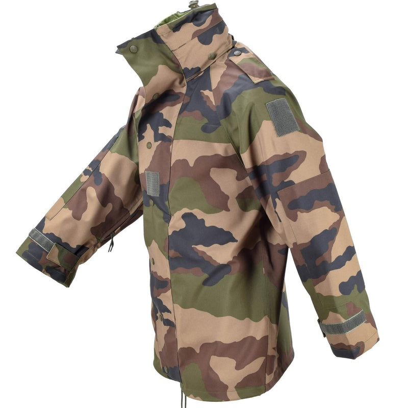 Genuine French Army waterproof trilaminate camo jacket with hood, storm flap, adjustable cuffs, and reinforced elbows.