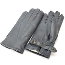 Pair of genuine German police grey leather gloves with wool lining, designed for winter warmth and durability.
