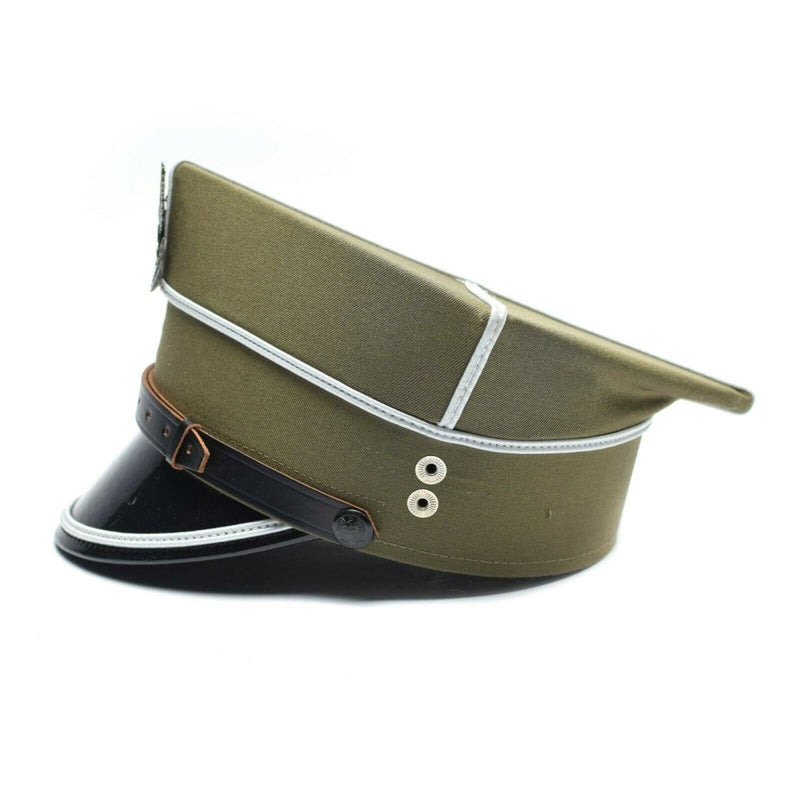 Vintage Polish army officer peaked cap in olive wool with black visor and eagle cockade insignia detail