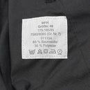 Clothing label on black MFH German Army style cargo pants showing size, fabric composition, and care instructions.