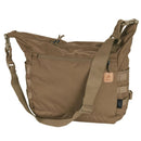 Tan Helikon-Tex Bushcraft Satchel shoulder bag with MOLLE panels, adjustable strap, and multiple zippered pockets for outdoor use.