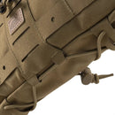 Close-up of tan Helikon-Tex Numbat Small chest pack made of 500D Cordura with MOLLE webbing and adjustable cords
