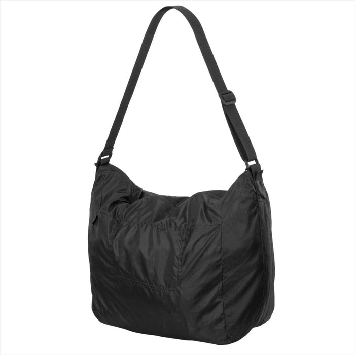 Zwarte Helikon-Tex opvouwbare schoudertas van 29 liter, gemaakt van duurzaam polyester voor reis- en back-upopslag