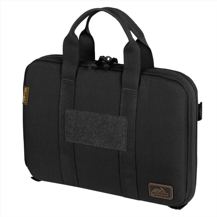 Étui portefeuille noir Helikon-Tex Single Pistol en nylon Cordura avec intérieur rembourré et deux poignées pour un rangement sécurisé des armes de poing