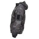 Side view of MIL-TEC lightweight CCE night camouflage anorak jacket with hood and zippered sleeve pocket