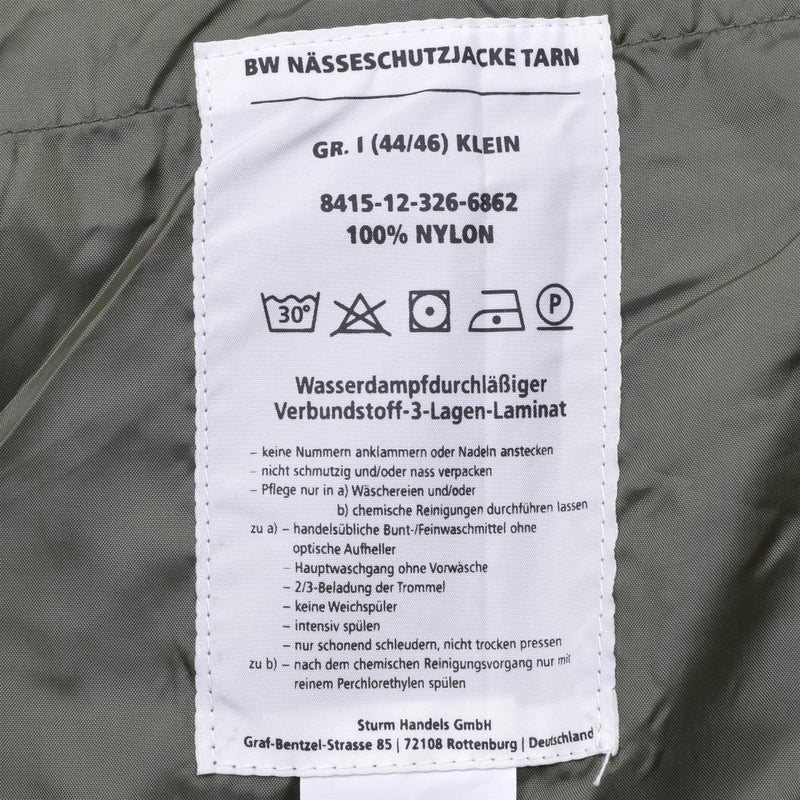 Care label inside Mil-Tec German army waterproof GoreTex Flecktarn field jacket showing fabric and care instructions
