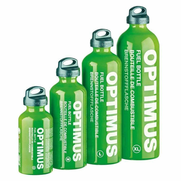 Set of four green Optimus fuel bottles in different sizes with child safety screw caps for camping stoves.