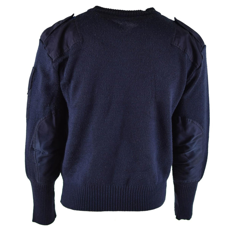 Original British Defence Service blue V-neck wool Commando jumper with reinforced elbows and shoulders, rib-knit cuffs and waist.
