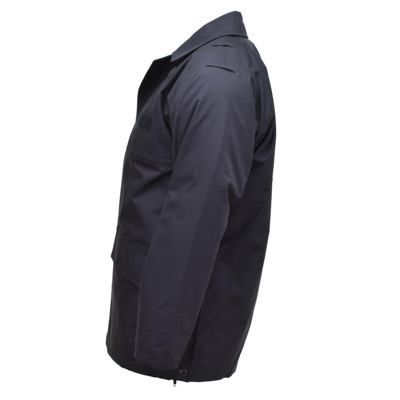 Side view of solid black British military rain jacket with waterproof and windproof design, durable and lined for warmth.