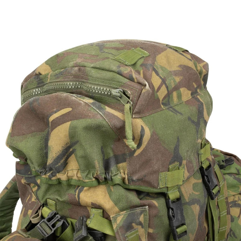 Original British Military tactical backpack in woodland camo with 90 liters capacity and secure side pockets.