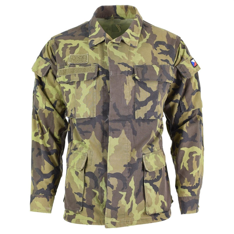 Original Czech army field jacket in leaf camo pattern with multiple pockets and Czech flag patch on the arm.