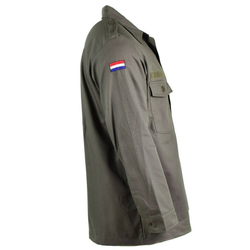 Side view of Original Dutch Army M65 military shirt jacket with Dutch flag patch on sleeve and chest pockets
