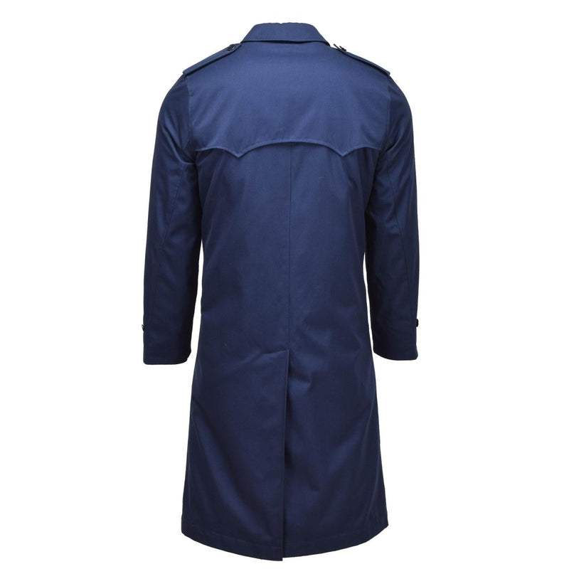 Back view of Original Dutch Military women's blue trench coat with quilted liner and long length design.