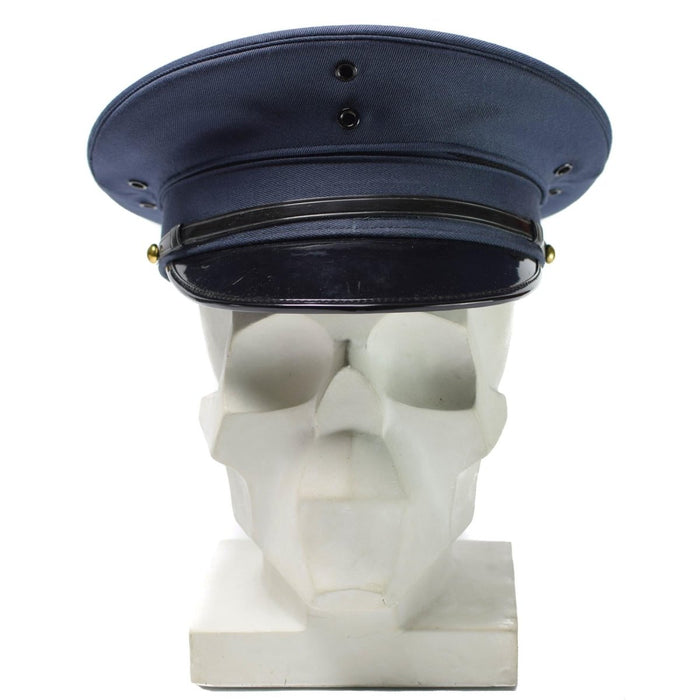 Casquette originale à visière d'officier de l'armée coréenne en mélange de laine bleue avec visière noire et mentonnière affichée sur le modèle de crâne
