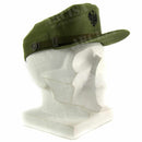 Olive green Spanish military visor cap with emblem and chin strap displayed on white mannequin head side view
