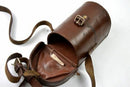 Vintage brown leather carrying case for Original Yugoslavian army ON-M59 monocular sight tool with strap and buckle closure.