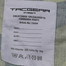 Close-up of TACGEAR Swedish Military style combat pants label showing fabric details and care instructions on splinter camo ripstop material.