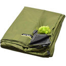 Folded olive green Tatonka waterproof tent trap shelter with attached bright green guy rope for outdoor use.