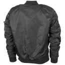 Back view of black U.S. Air Force MA1 bomber jacket with ribbed cuffs, waistband, and arm pocket detail